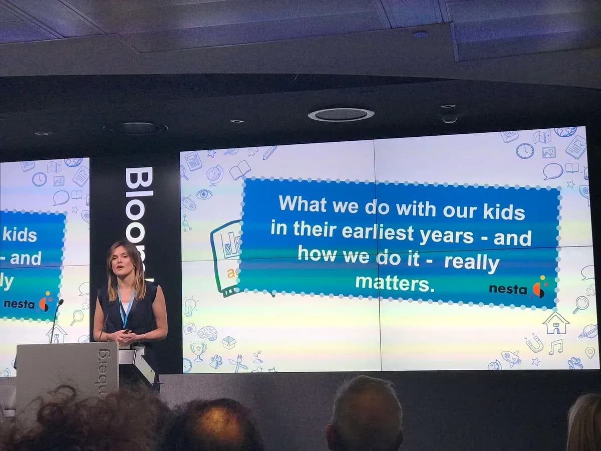 Boromi speaking on stage about why early play matters
