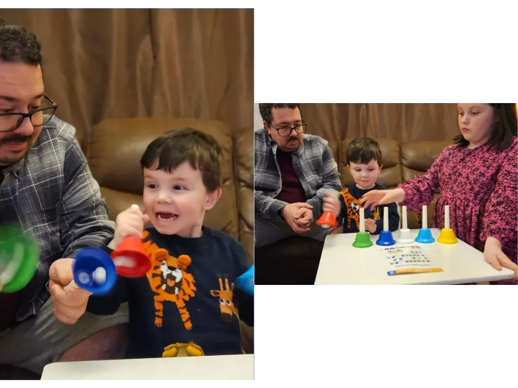 A child smiling while playing with colourful toys